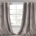 What are the benefits of using velvet curtains in interior design
