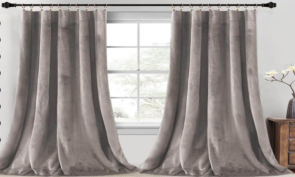What are the benefits of using velvet curtains in interior design